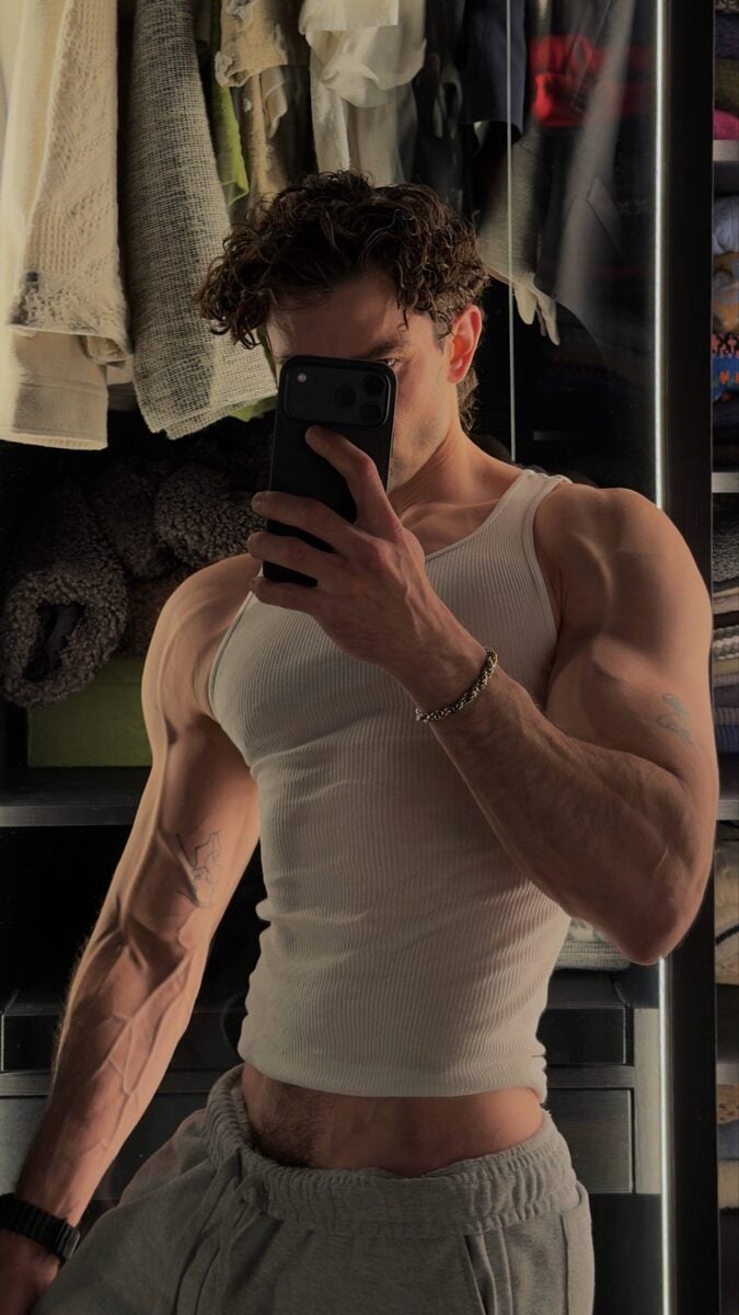 Guys in white ribbed undershirts